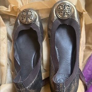 Tory Burch Metallic Black Flats with Gold Emblem